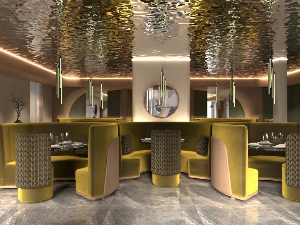 Ristorante gourmet in Val di Fassa: il Mirage al Latemar Area pranzo moderna con sedute verdi a forma di mezzaluna e soffitto riflettente