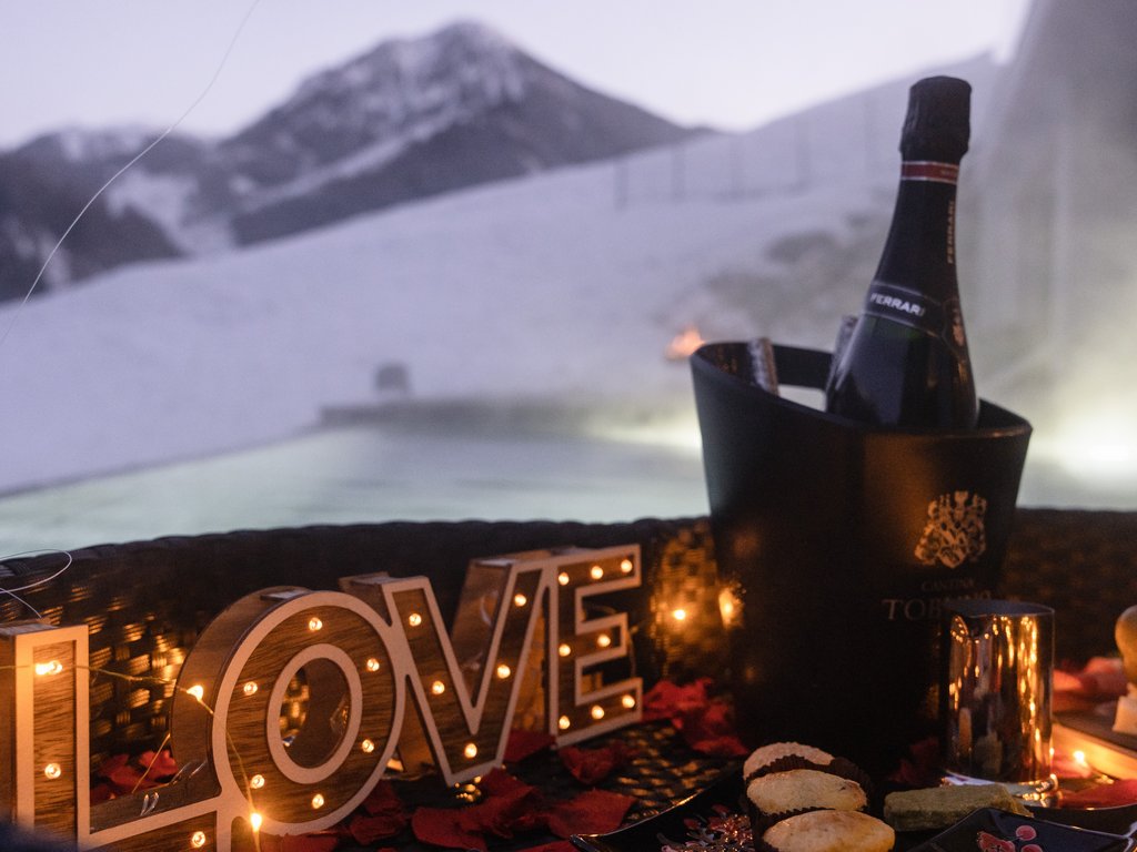 On the cycle track, from Moena to your romantic oasis Romantic dinner with sushi, wine bottle, LOVE lights and snowy mountain background